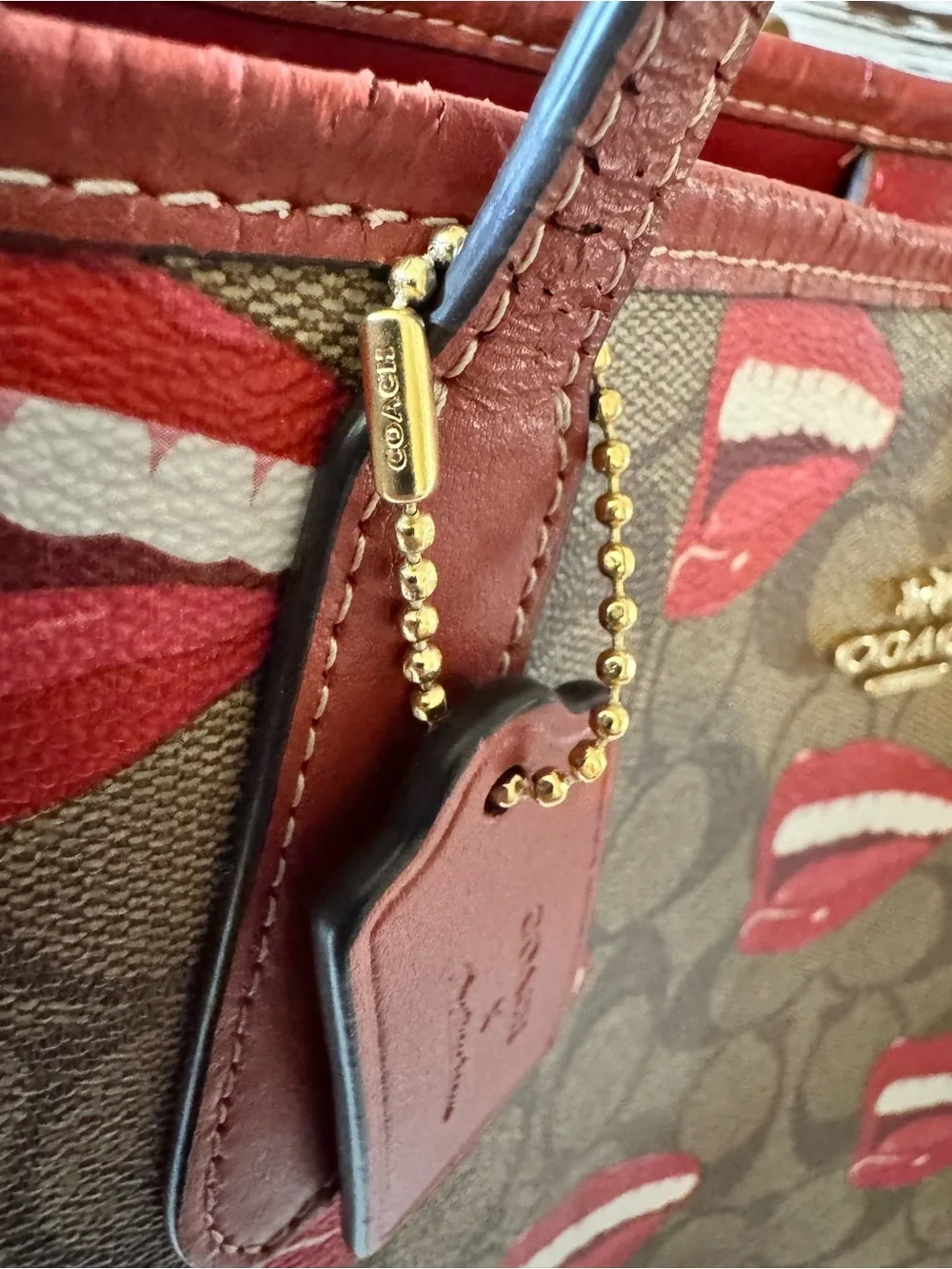 Coach x Tom Wesselman 2023 City Tote signature khaki w red smile mouth lips